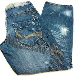 Rocawear mens jeans. No size tags. See pictures for measurements.